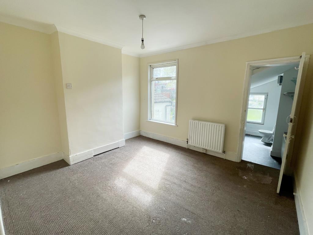 Lot: 2 - MID-TERRACE HOUSE WITH POTENTIAL - Bedroom 2 leading through to bathroom